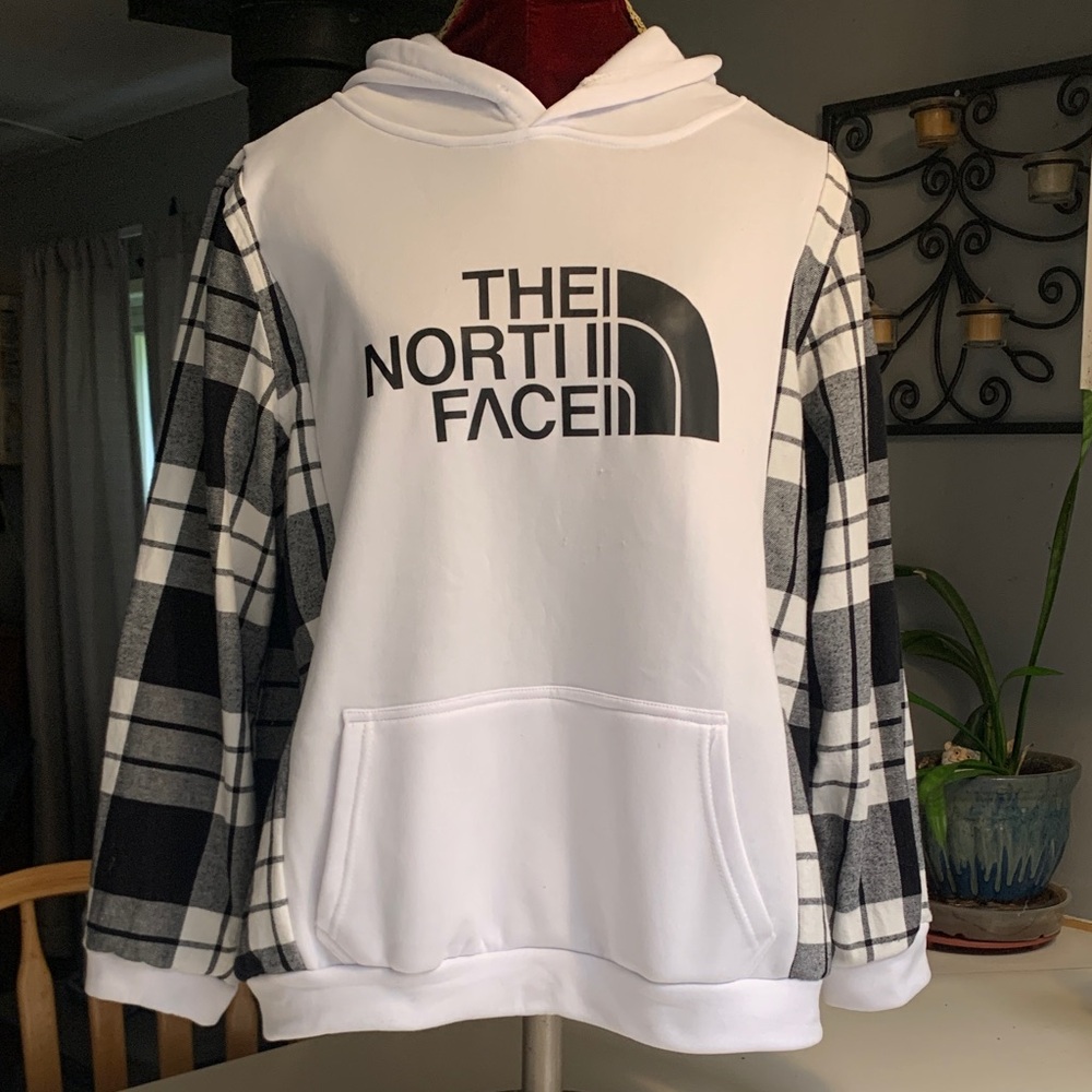 Upcycled “The North Face”White Hoodie with Black Plaid Sleeves.